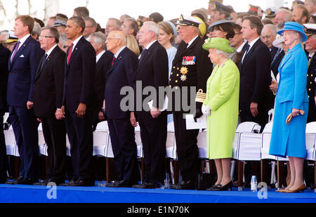 Normandie, France. 06 Juin, 2014. Le Roi Willem-Alexander des Pays-Bas (première rangée, L-R), le président polonais Bronislaw Komorowski, le président américain Barack Obama, président de la République italienne Giorgio Napolitano, le président slovaque Ivan Gasparovic, le Roi Harald V de Norvège, la reine Elizabeth II et de la Reine Margrethe II du Danemark pendant le 70e anniversaire du débarquement, à Sword Beach, de Ouistreham, Normandie, France, 06 juin 2014. Dpa : Crédit photo alliance/Alamy Live News Banque D'Images