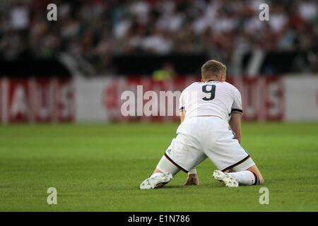 Mainz, Allemagne. 06 Juin, 2014. André Schuerrle de l'Allemagne, c'est de prendre de la hauteur avec des blessures au cours de la match amical entre l'Allemagne et l'Arménie à la Coface Arena à Mainz, Allemagne, 06 juin 2014. Photo : Fredrik von Erichsen/dpa/Alamy Live News Banque D'Images