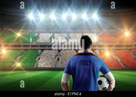 Image composite de l'Italie football player holding ball Banque D'Images