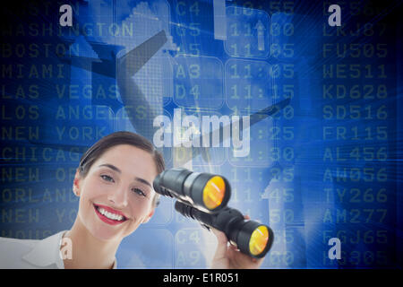 Portrait of business woman with binoculars Banque D'Images