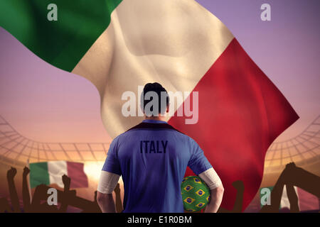 Image composite de l'Italie football player holding ball Banque D'Images