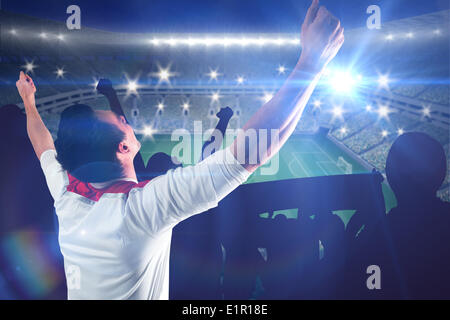 Image composite de football fan cheering Banque D'Images