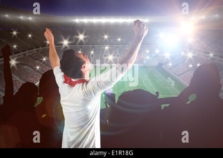 Image composite de football fan cheering Banque D'Images