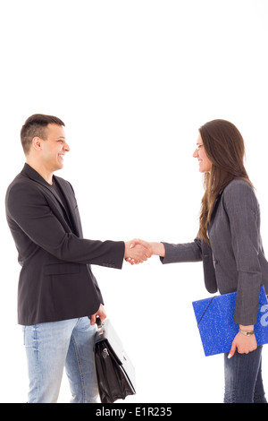 Businessman and businesswoman shaking hands sur un accord Banque D'Images