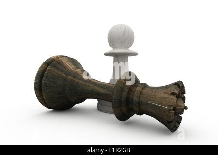 Le pion blanc debout sur tombé roi noir Banque D'Images