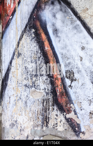Gaffiti libre dans un mur de béton endommagé Banque D'Images