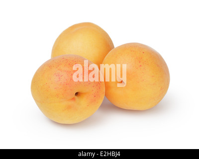 Trois abricots mûrs, isolé sur fond blanc Banque D'Images