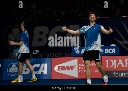 Jakarta, Indonésie. 22 Juin, 2014. Lee Yong Dae (R) et Yoo Yeon Seong de Corée du Sud réagir après avoir remporté le double masculin final du BCA Indonésie Ouvrir 2014 contre Mohammad Ahsan et Hendra Setiawan de l'Indonésie à Istora Senayan Jakarta, Indonésie, le 22 juin 2014. Lee Yong Dae et Yoo Yeon Seong a gagné 2-0. Sanovri Crédit : Veri/Xinhua/Alamy Live News Banque D'Images