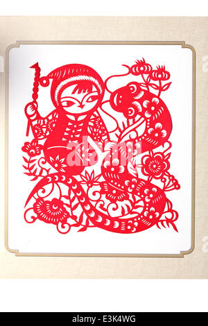 Coupe-papier de l'enfant et le serpent Banque D'Images