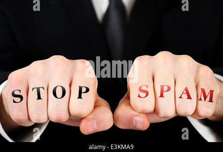 Businessman showing stop spam mot sur fist Banque D'Images