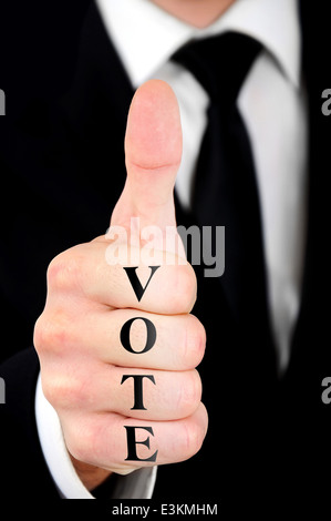 Businessman showing ok sign avec vote mot Banque D'Images