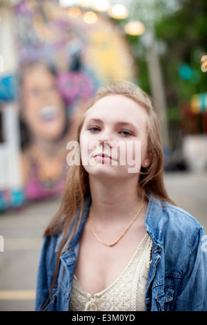 Portrait of young blonde woman looking at camera Banque D'Images