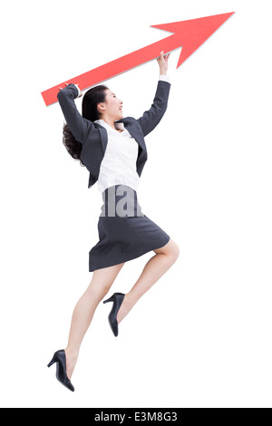 Businesswoman with red arrow sign Banque D'Images