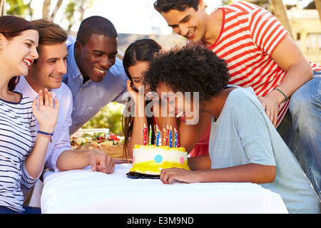 Group of Friends Celebrating Birthday Outdoors Banque D'Images