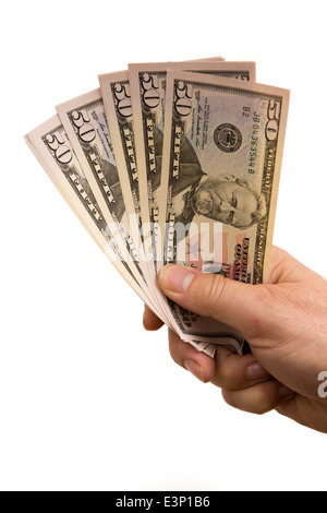 USA, monnaie, man's hand holding fist plein de cinquante dollars Banque D'Images