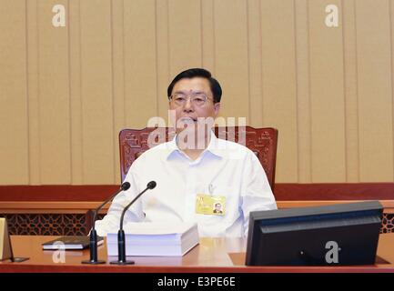 Beijing, Chine. 24 Juin, 2014. Zhang Dejiang, président du Comité permanent de l'Assemblée populaire nationale (APN), assiste à la deuxième séance plénière de la 9e session de la 12e APN Comité permanent à Beijing, Chine, 24 juin 2014. © Ding Lin/Xinhua/Alamy Live News Banque D'Images