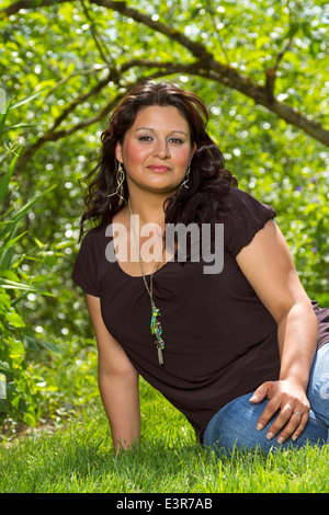 Portrait of Hispanic American Woman in the park Banque D'Images