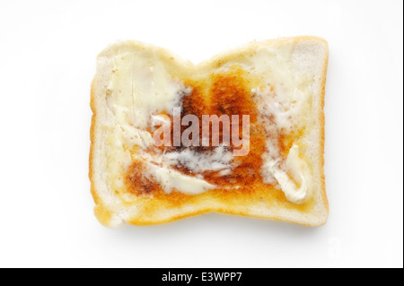 Une tranche de pain blanc beurré Banque D'Images