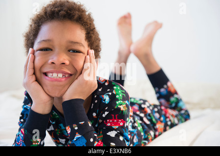 Black Boy smiling in pyjamas Banque D'Images