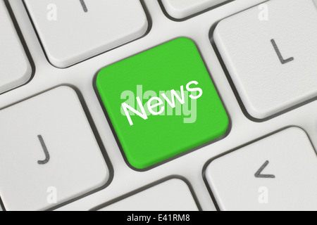 Bouton vert news sur clavier close-up Banque D'Images