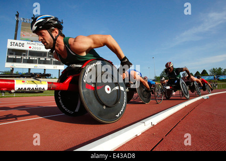 Les concurrents dans l'épreuve du 1500 mètres en fauteuil roulant à l'Agence canadienne d'Athlétisme le 28 juin 2014 à Moncton. Banque D'Images