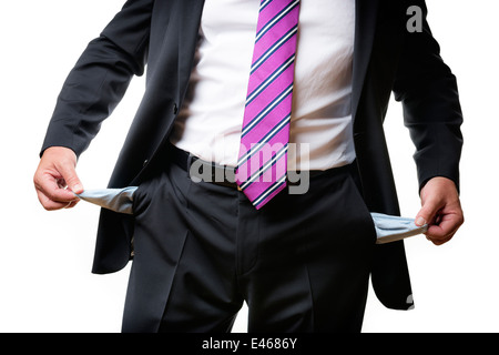 Homme d'affaires en costume sombre et cravate et poches vides Banque D'Images