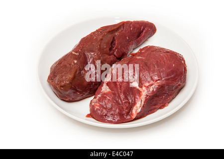 Steaks de viande de kangourou crus isolated on a white background studio. Banque D'Images