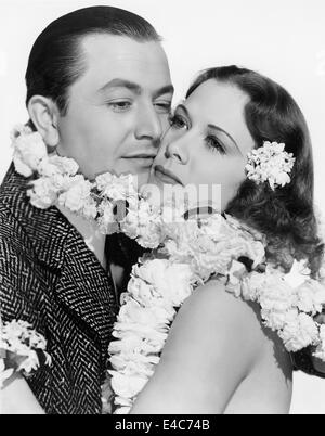 Robert Young, Eleanor Powell, Portrait publicitaire pour le film, "Honolulu", 1939 Banque D'Images