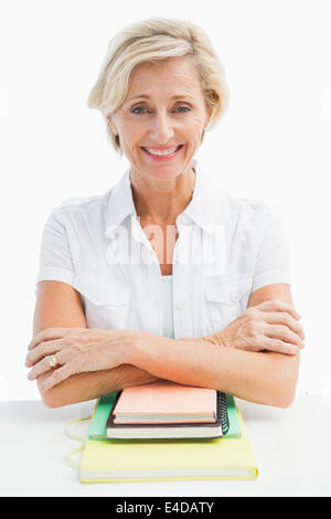 Mature student sitting avec les ordinateurs portables Banque D'Images