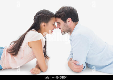 Attractive young couple smiling at each other Banque D'Images