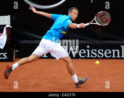 Stuttgart, Allemagne. 10 juillet, 2014. Le joueur de tennis allemand de commentaires en action au cours de la deuxième ronde du match contre Rosol à partir de la République tchèque à la coupe du tournoi ATP de Mercedes à Stuttgart, Allemagne, 10 juillet 2014. Photo : DANIEL MAURER/dpa/Alamy Live News Banque D'Images