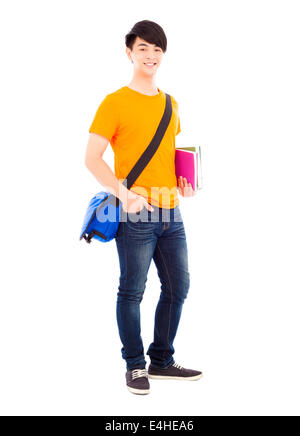 Confiant student holding books et sac à dos oblique Banque D'Images