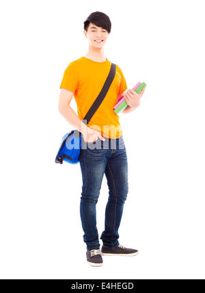 Young student holding books et sac à dos oblique Banque D'Images