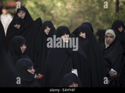 Téhéran, Iran. 12 juillet, 2014. 12 juillet 2014 - Téhéran, Iran - les femmes voilées iraniennes assister à un rassemblement à l'appui de l'hijab (vinaigrette) Code islamique dans le parc Mellat (Nation) dans le nord de Téhéran. Morteza Nikoubazl/ZUMAPRESS : Morteza Nikoubazl Crédit/ZUMA/Alamy Fil Live News Banque D'Images