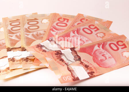 Service Canada et 50 ventilateur 100 dollar bills Banque D'Images