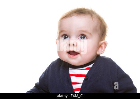 Portrait of Beautiful Happy Baby fille en bleu blanc rouge Outfit Isolated Banque D'Images