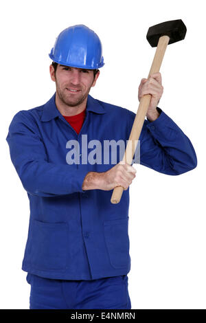 Construction Worker holding un maillet Banque D'Images