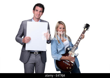 Adolescent ayant une leçon de guitare Banque D'Images