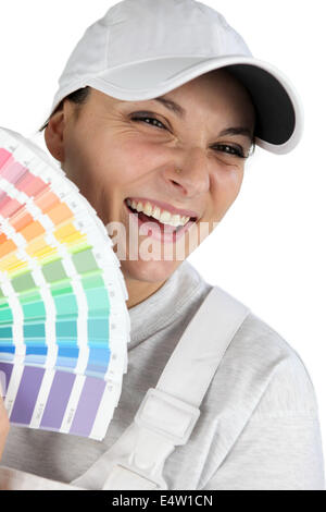 Cartes couleur peinture holding Décorateur Banque D'Images