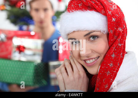 Girl in Santa hat Banque D'Images