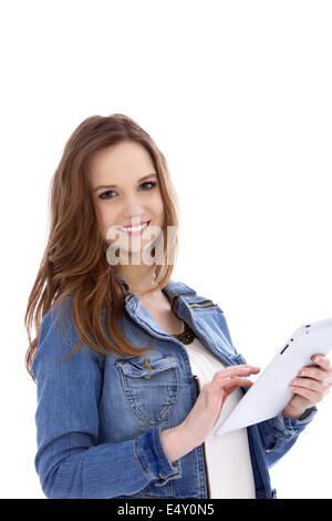 Attractive young woman using a tablet Banque D'Images