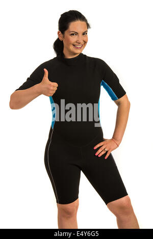 Surfer avec succès femme en néoprène giving Thumbs up isolé sur fond blanc Banque D'Images