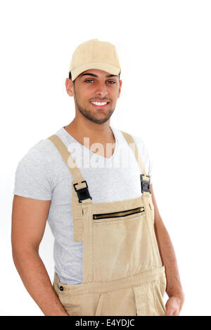 Bel homme en salopette et chapeau Banque D'Images
