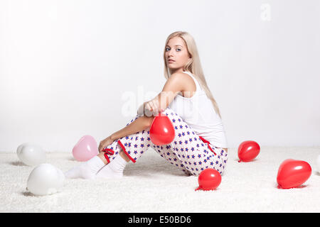 Femme blonde avec des ballons Banque D'Images