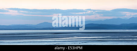 Coucher de soleil sur la baie de Morecambe, Lancashire. Banque D'Images