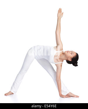 Adolescent asiatique des femmes faisant du yoga against white background Banque D'Images