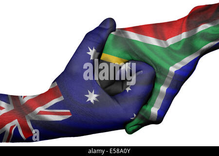 Poignée de main entre diplomatique Pays : drapeaux de l'Australie et l'Afrique du Sud, les deux mains en surimpression Banque D'Images