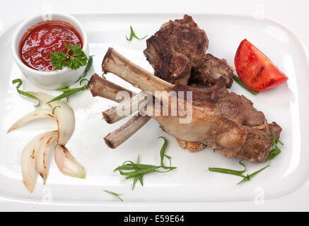 Des plats de viande avec légumes et épices Banque D'Images