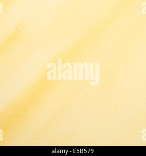 Contexte aquarelle monochrome sur papier en jaune Banque D'Images
