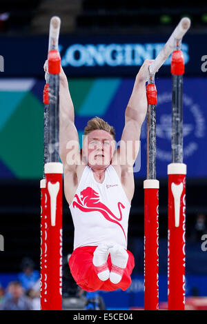 Glasgow, Ecosse. 27 juillet, 2014. Les Jeux du Commonwealth de Glasgow 2014 Jour 4. Podium de gymnastique artistique de la formation. Nil Wilson de l'Angleterre en action sur les barres parallèles. Credit : Action Plus Sport/Alamy Live News Banque D'Images